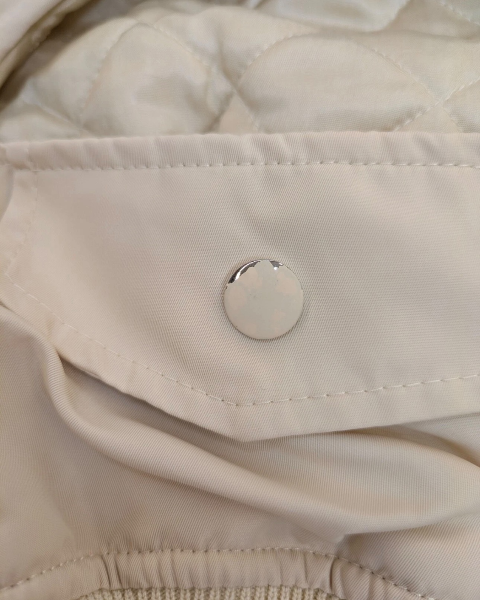Coperni Cut-Out Cropped Twill Bomber Jacket in Cream